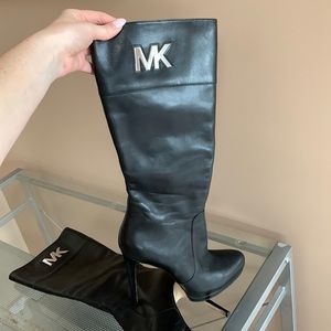 Black Michael kors boots with platform and logo hardware detail